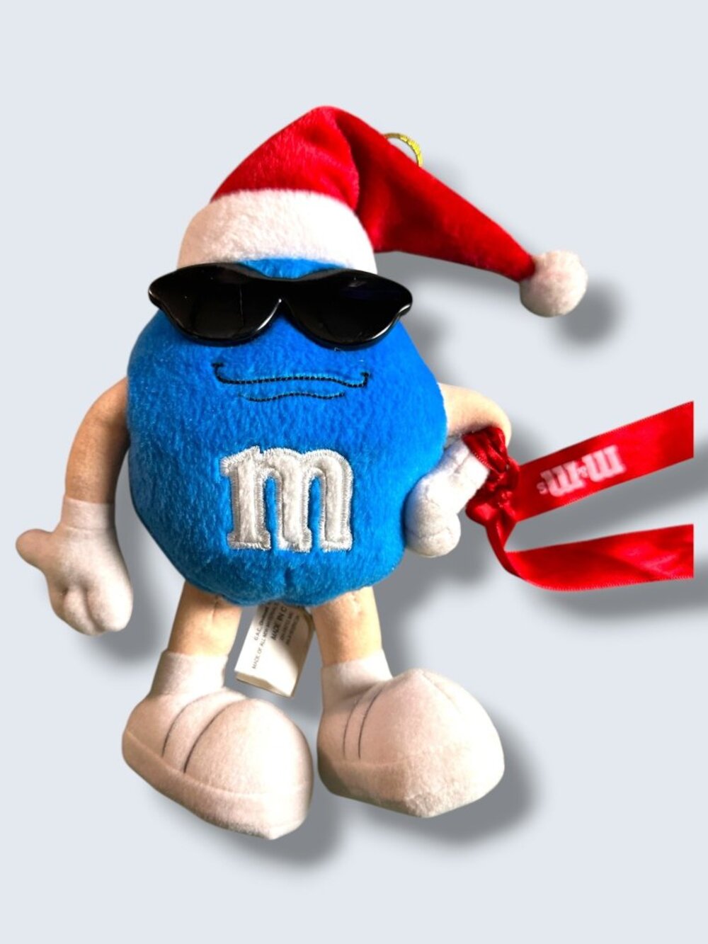 M&Ms Blue Plush Christmas Ornament With Santa Hat & Sunglasses - Holiday Collect